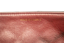 Borsa a tracolla CHANEL con catena a patta intera Pochette in pelle di agnello trapuntata nera L97